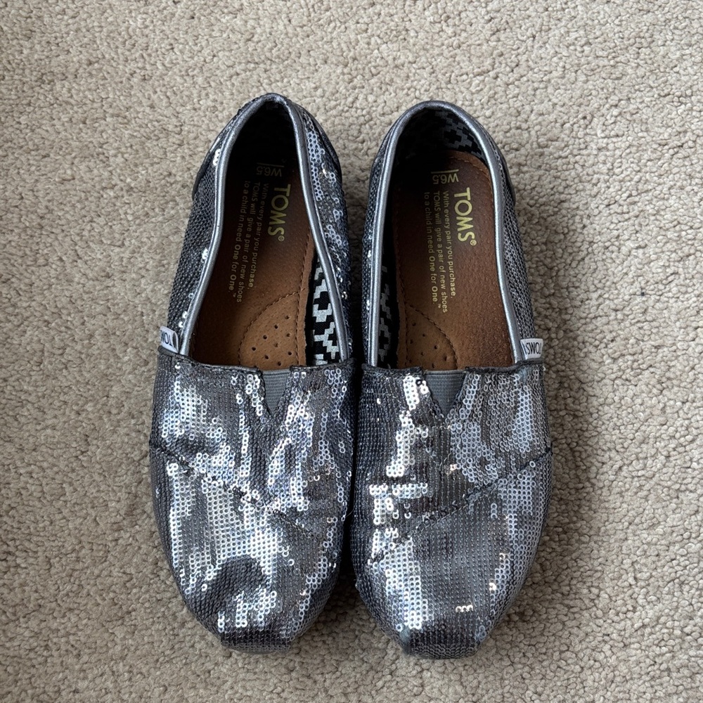 TOMS Glittering Silver Slip-Ons